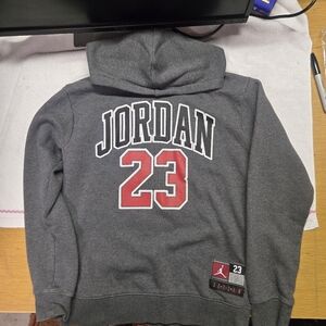 Nike Air Jordan Kids L lightly used. Hoodie in great condition. Details
